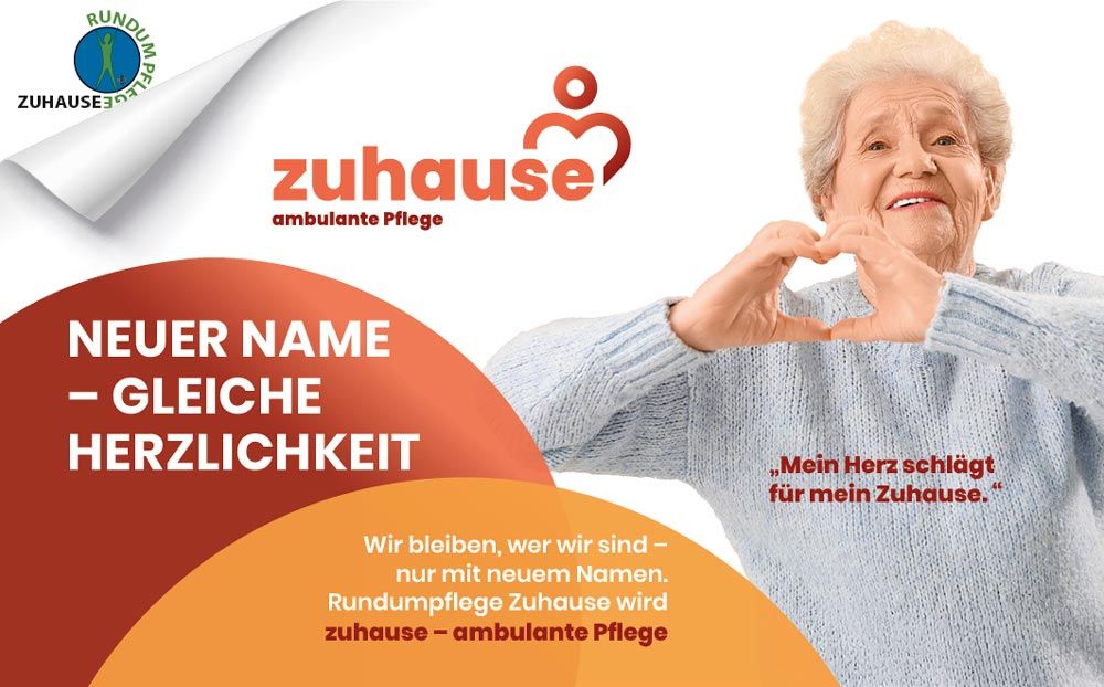 Ältere Dame zeigt Herz-Symbol für Slogan "Neuer Name, gleiche Herzlichkeit"